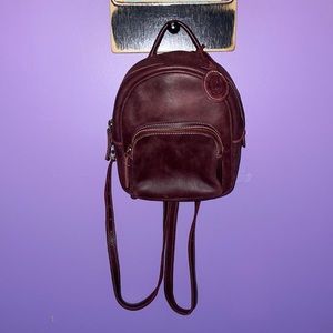 Burgundy Canada Roots Minnie Backpack